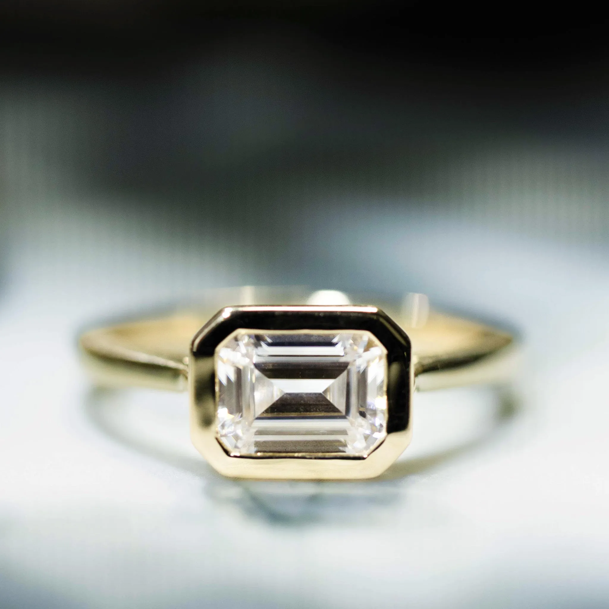 Emerald Cut Bezel Set Engagement Ring