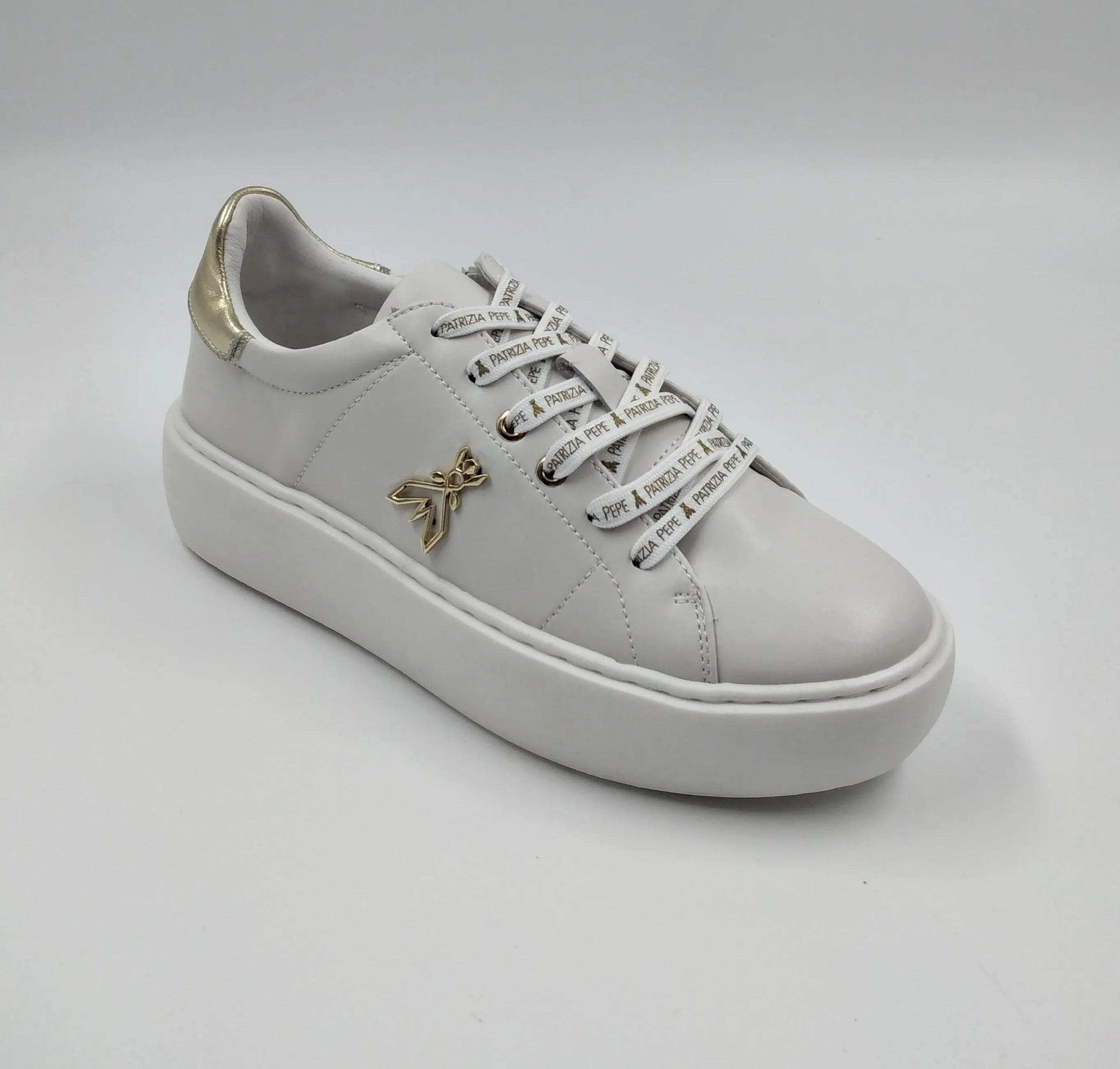 SNEAKERS PELLE LOGO METALLO